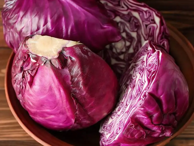 Half cut red cabbages in a bowl